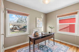 Office space featuring hardwood / wood-style floors