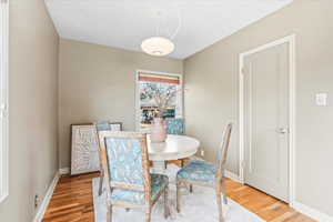 Dining area featuring hardwood / wood-style floors