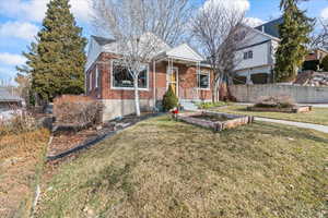 View of front of home featuring a front yard