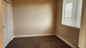 Empty room featuring carpet