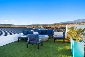 View of yard with a mountain view and outdoor lounge area