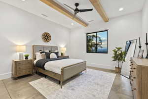 Bedroom featuring beamed ceiling and ceiling fan