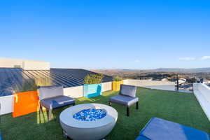 View of yard with a fire pit