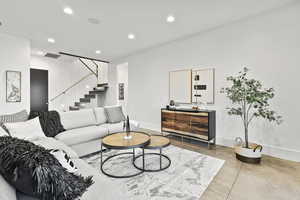 Living room featuring concrete floors