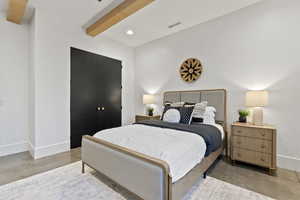 Bedroom with beamed ceiling