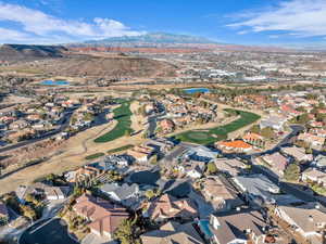 Aerial view featuring a water and mountain view