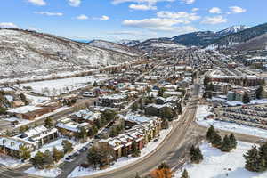 Snowy aerial view with a mountain view