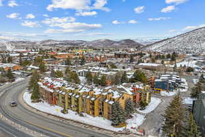 Snowy aerial view with a mountain view