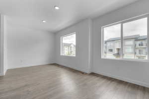 Unfurnished room with light hardwood / wood-style flooring