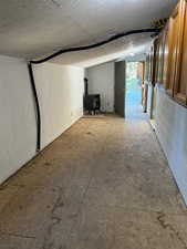 Basement featuring a wood stove