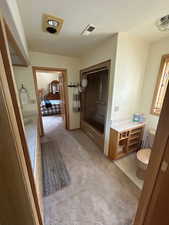 Bathroom with vanity and toilet