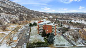 Snowy aerial view with a mountain view