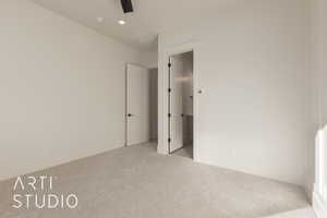 Unfurnished bedroom featuring light carpet and ceiling fan