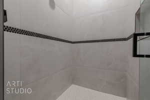 Bathroom with a tile shower