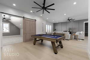 Game room with a barn door, ceiling fan, light wood-type flooring, and billiards