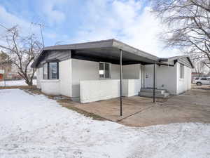 View of snow covered property