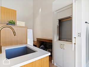 Kitchen featuring sink and light hardwood / wood-style flooring