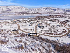 Snowy aerial view with a mountain view