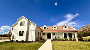 View of front of home with a front yard