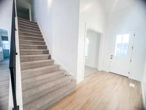 Foyer with light wood-type flooring