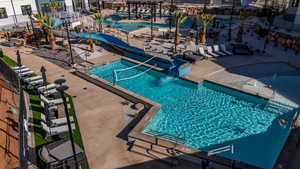 View of pool featuring a patio area and a water slide