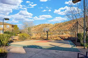 View of basketball court with a mountain view