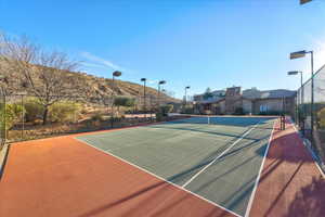 View of sport court featuring a mountain view and basketball court