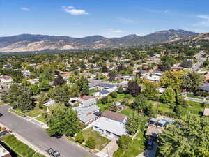 Birds eye view of property with a mountain view