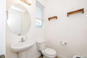 Bathroom with toilet and sink