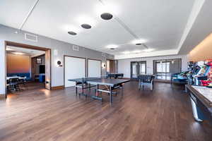 Playroom featuring dark hardwood / wood-style floors