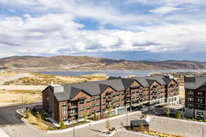 Bird's eye view featuring a water and mountain view