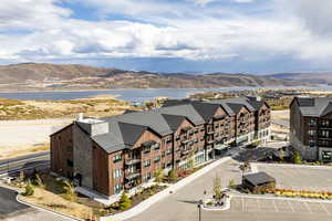 Bird's eye view featuring a water and mountain view