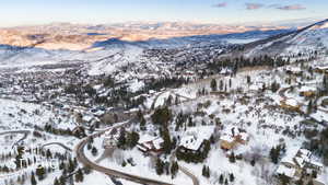 Snowy aerial view with a mountain view