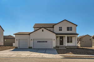 View of front of home with a garage