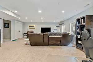 Living room with light carpet