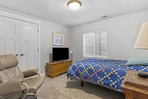 View of carpeted bedroom