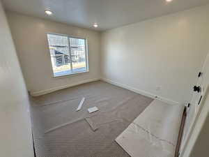 View of carpeted spare room