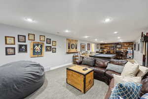 Living room featuring pool table