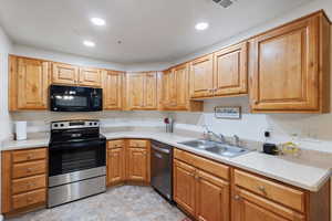 Kitchen featuring sink and stainless steel appliances