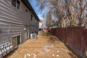 View of yard featuring central AC unit