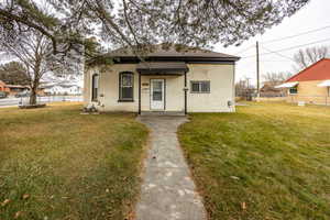 View of front of home with a front lawn