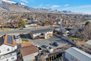 Birds eye view of property featuring a mountain view