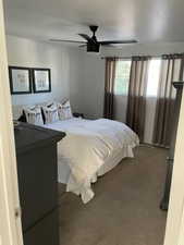 Bedroom with carpet floors and ceiling fan