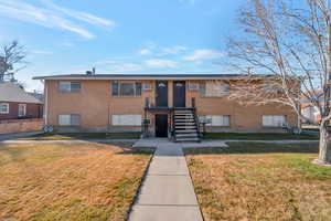 View of front of home with a front lawn