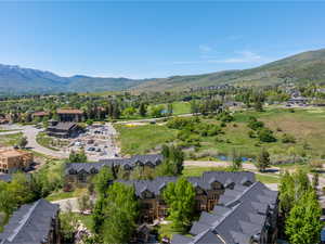 Aerial view of residential area with a mountain backdrop