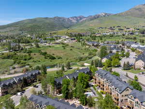 Aerial view of residential area featuring mountains