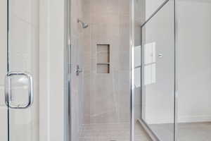 Bathroom with an enclosed shower