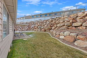 View of yard with a patio