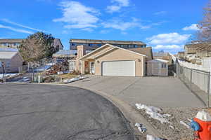 View of front property including rv parking, storage shed