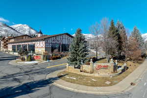 Snow covered building featuring a mountain view